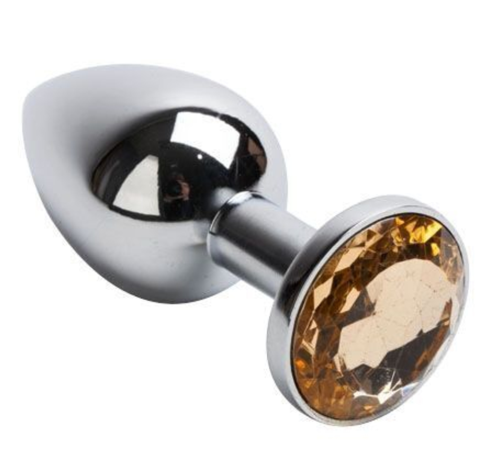 Серебристая анальная пробка с желтым кристаллом - 7,6 см. (Цвет: желтый)