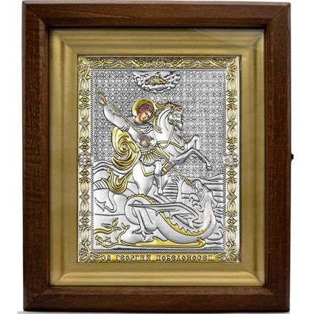 Икона Георгия Победоносца в серебряном окладе.