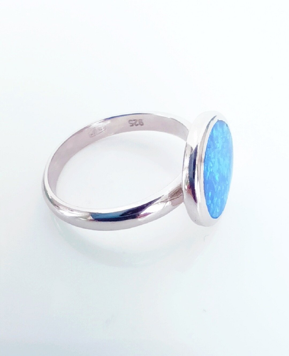 Кольцо Эстерелла 925 пробы, с родированием, с синтетическим опалом/Ф