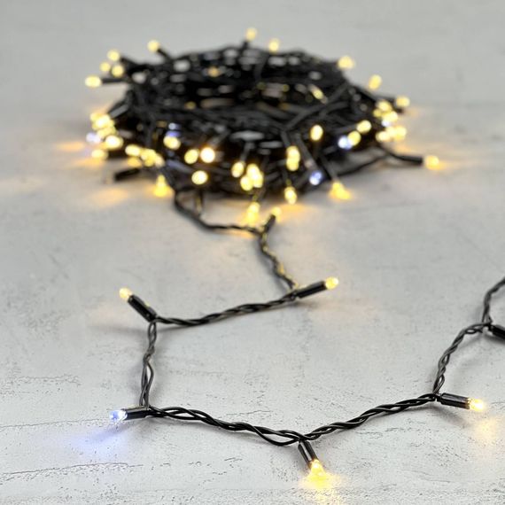 Светодиодная гирлянда с колпачком 100 теплых белых LED ламп 10 м., мерцание, 24В., черный провод ПВХ, IP65, LTC (PST100BLWCAP-11-1WW)