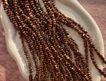 Нить гематитовых бусин 5-6мм, галтовка