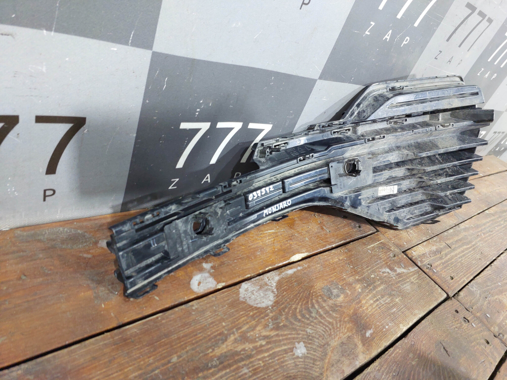 Накладка Решетка переднего бампера левая Geely Monjaro 21-нв Б/У Оригинал 6010177600