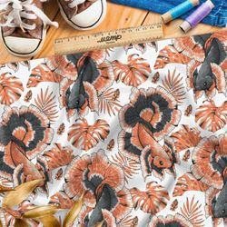 Ткань штапель крупные красные рыбы и листья на белом фоне