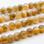 Тигровый глаз, диаметр около 6,3-6,5 мм, цена за 30-31 шт (1/2 нити)