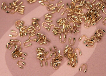 Протектор для тросика позолота S