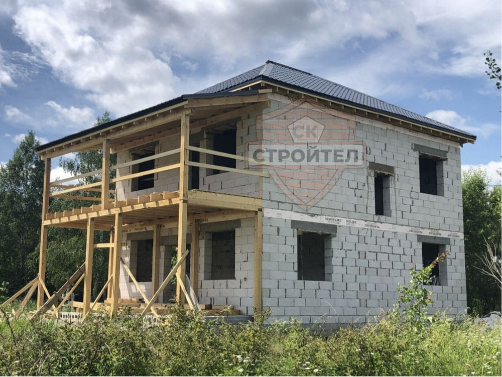 Строительство двухэтажного дома из блоков 210 м2