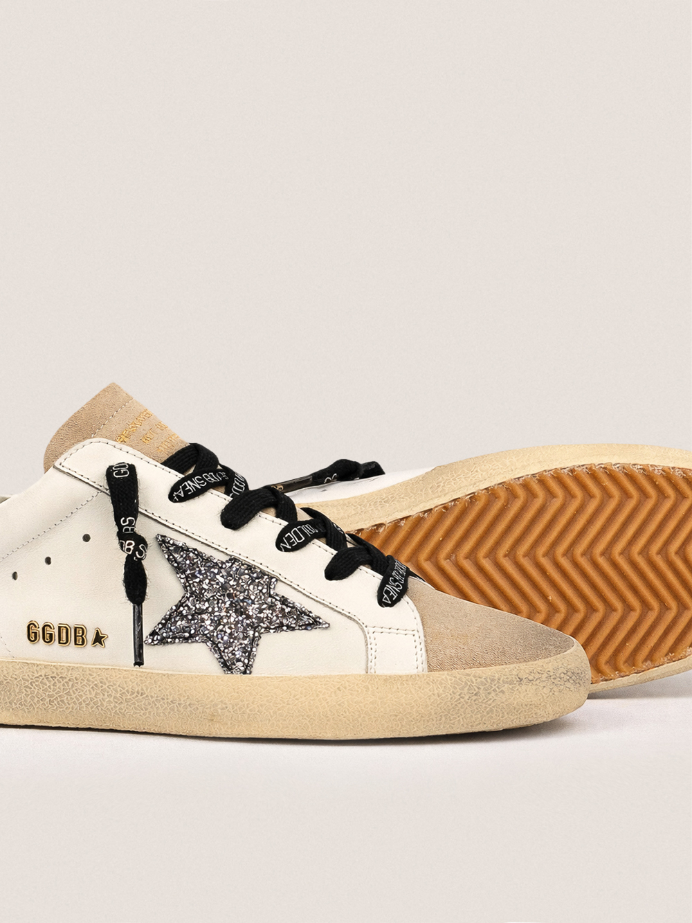 Super Star with black glitter star and gold glitter heel tab