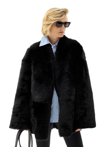 Черная двусторонняя шуба из овчины с поясом