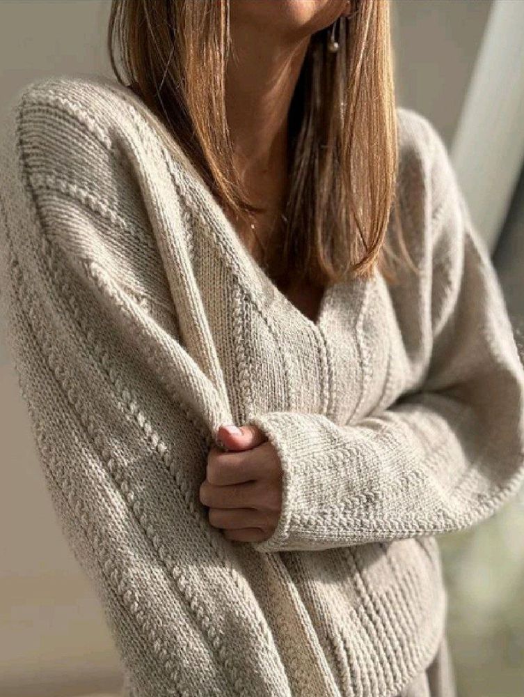 Описание по вязанию пуловера спицами "Flow Loop"