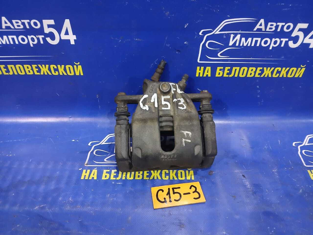 Суппорт тормозной передний левый NISSAN ALMERA 2014