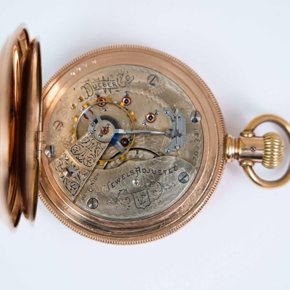 Позолоченные карманные часы