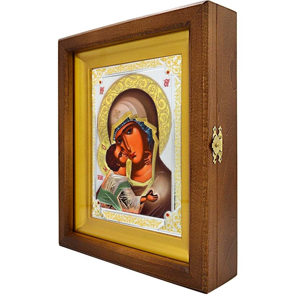 Владимирская икона Божьей Матери в серебряном окладе, в деревянном киоте.