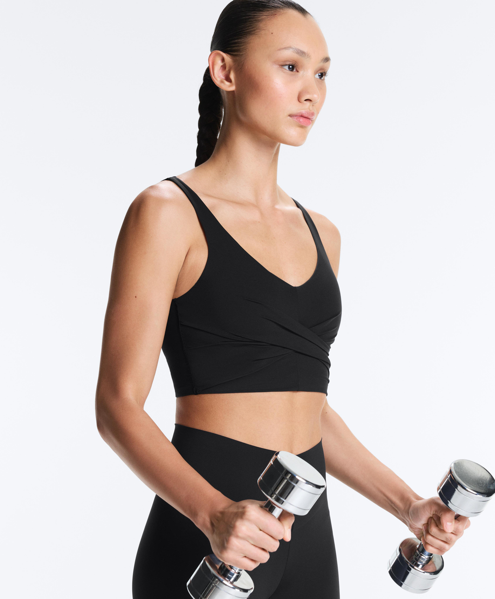 Oysho Топ Light Touch с перекрестной спинкой, черный