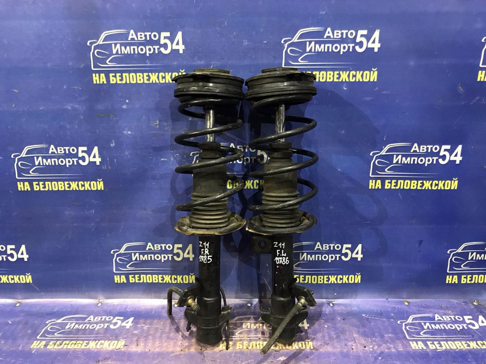 Стойка передняя левая NISSAN CUBE 2005-2008