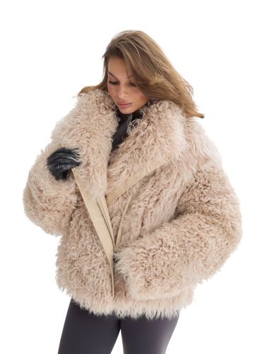 Бежевая шуба-косуха из овчины калган