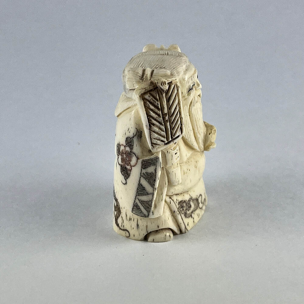 Статуэтка нэцкэ Чжан Голао – воплощение мудрости