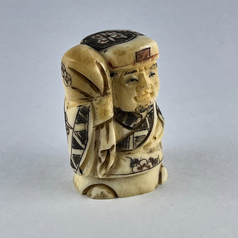 Статуэтка нэцкэ Дайкоку с мешком риса