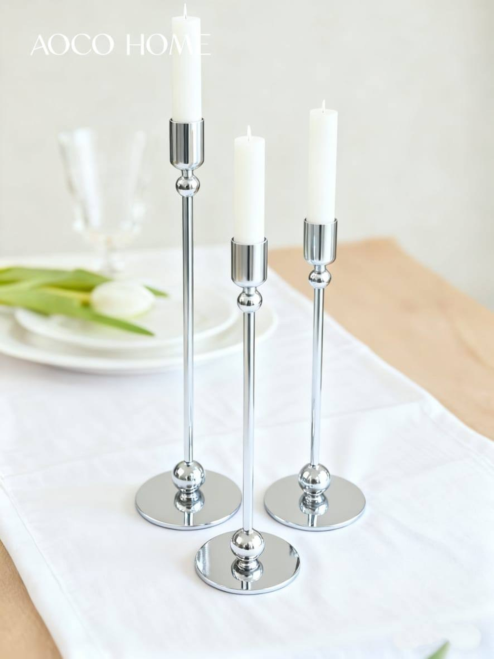 Серебряный набор из трех подсвечников