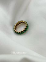 Кольцо золотистое с изумрудными камнями