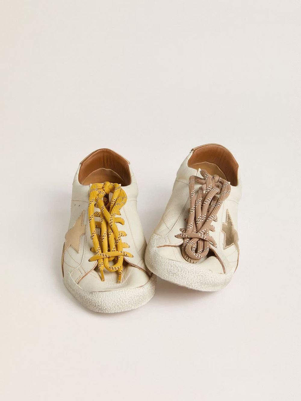 True Star in white nappa leather with gold star and beige suede heel tab
