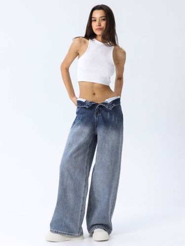 Темно-синие широкие джинсы женские