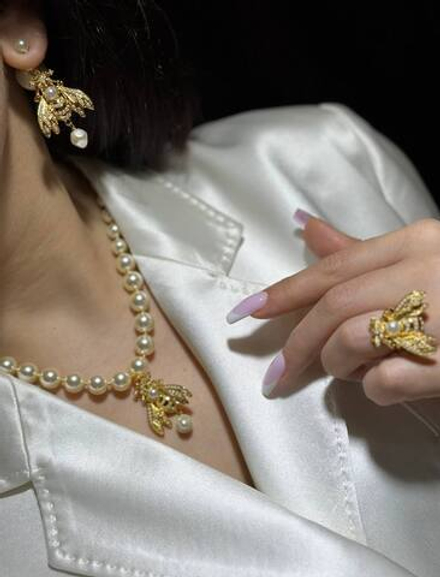 Бусы Dior