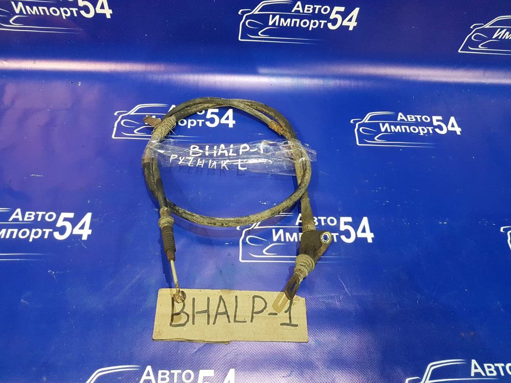 Трос ручника левый MAZDA FAMILIA 1995