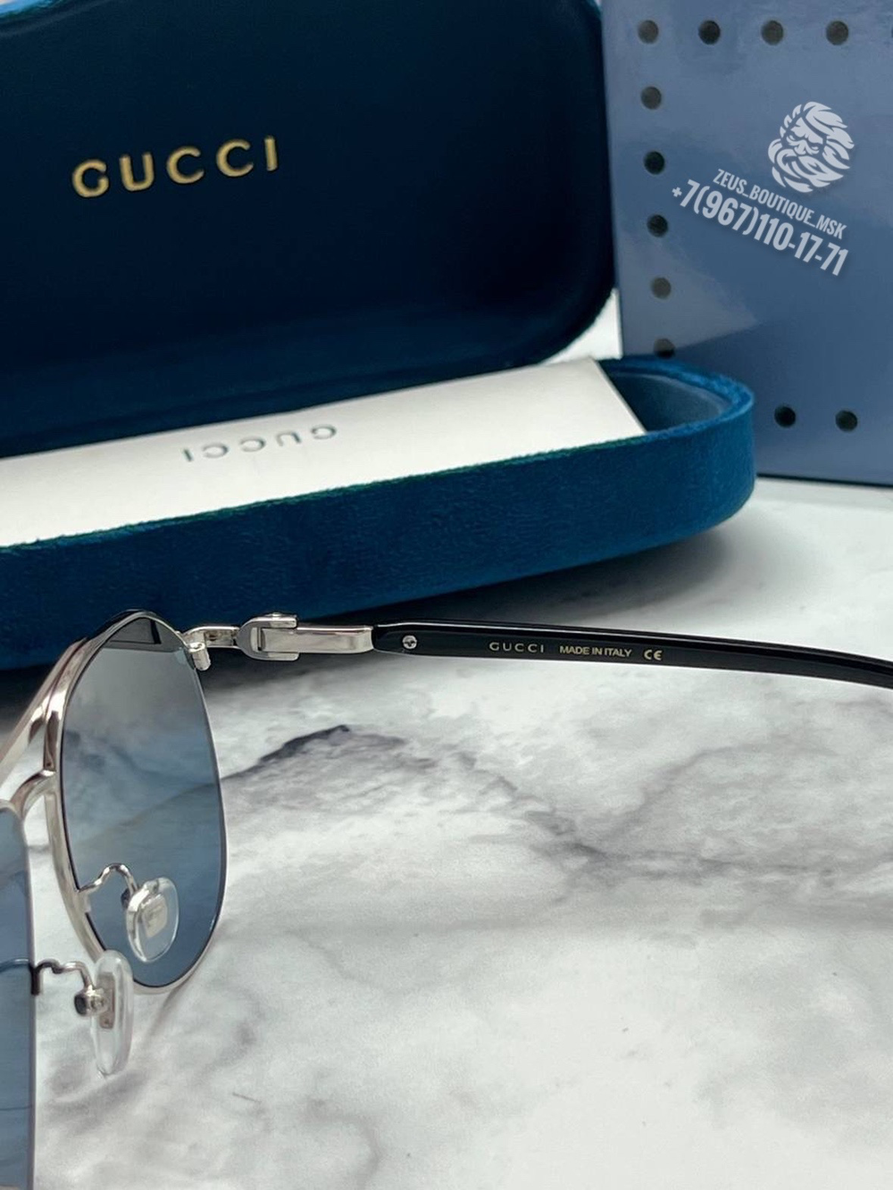Солнцезащитные очки Gucci