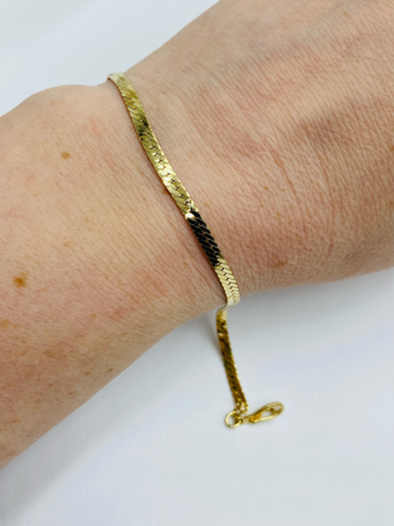 Блестящий браслет змейка