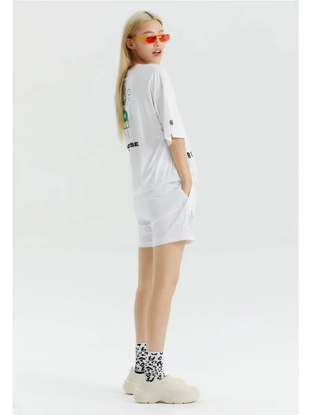 Шорты с сеткой по бокам и логотипом ladok