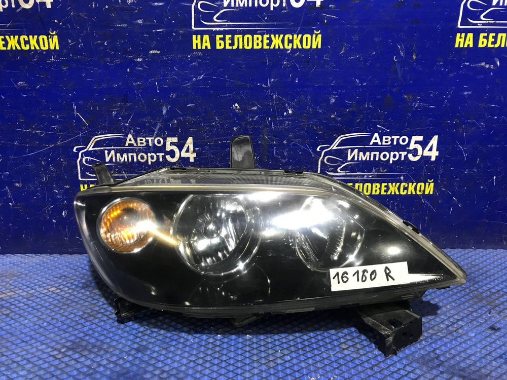 Фара передняя правая MAZDA DEMIO 2002-2005