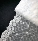 Вышивка на сетке белая К136