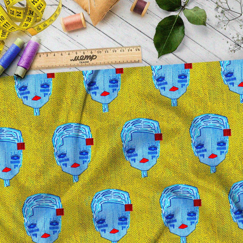 Ткань атлас синие кукольные головы на жёлтом фоне