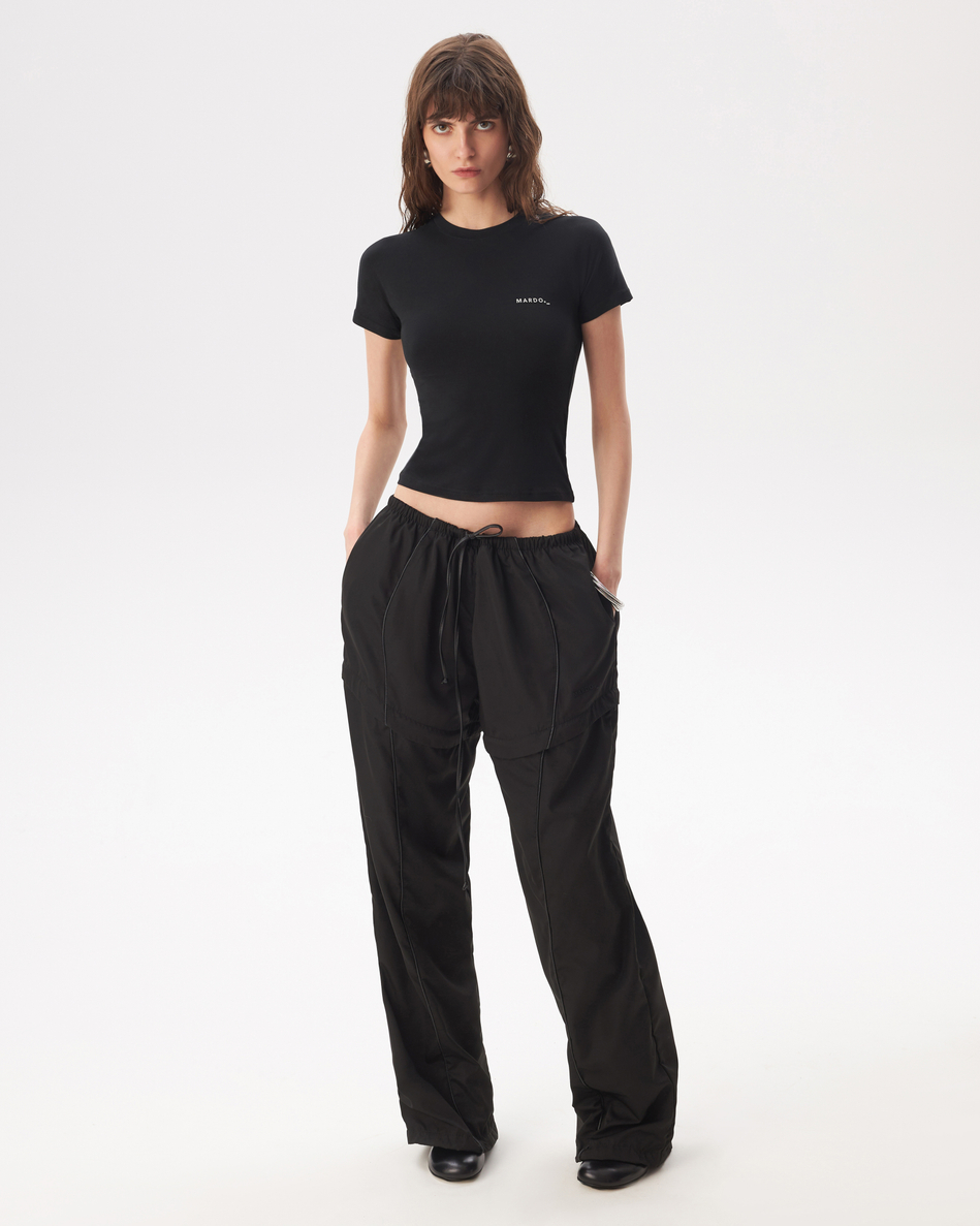 BLACK TRANSFORMING TRACKPANTS