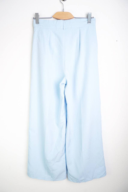 Брюки нежного оттенка, визуально на 48 размер