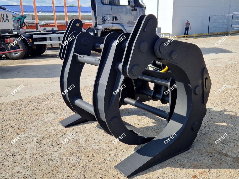 Захват лесной на Экскаватор-погрузчик New Holland