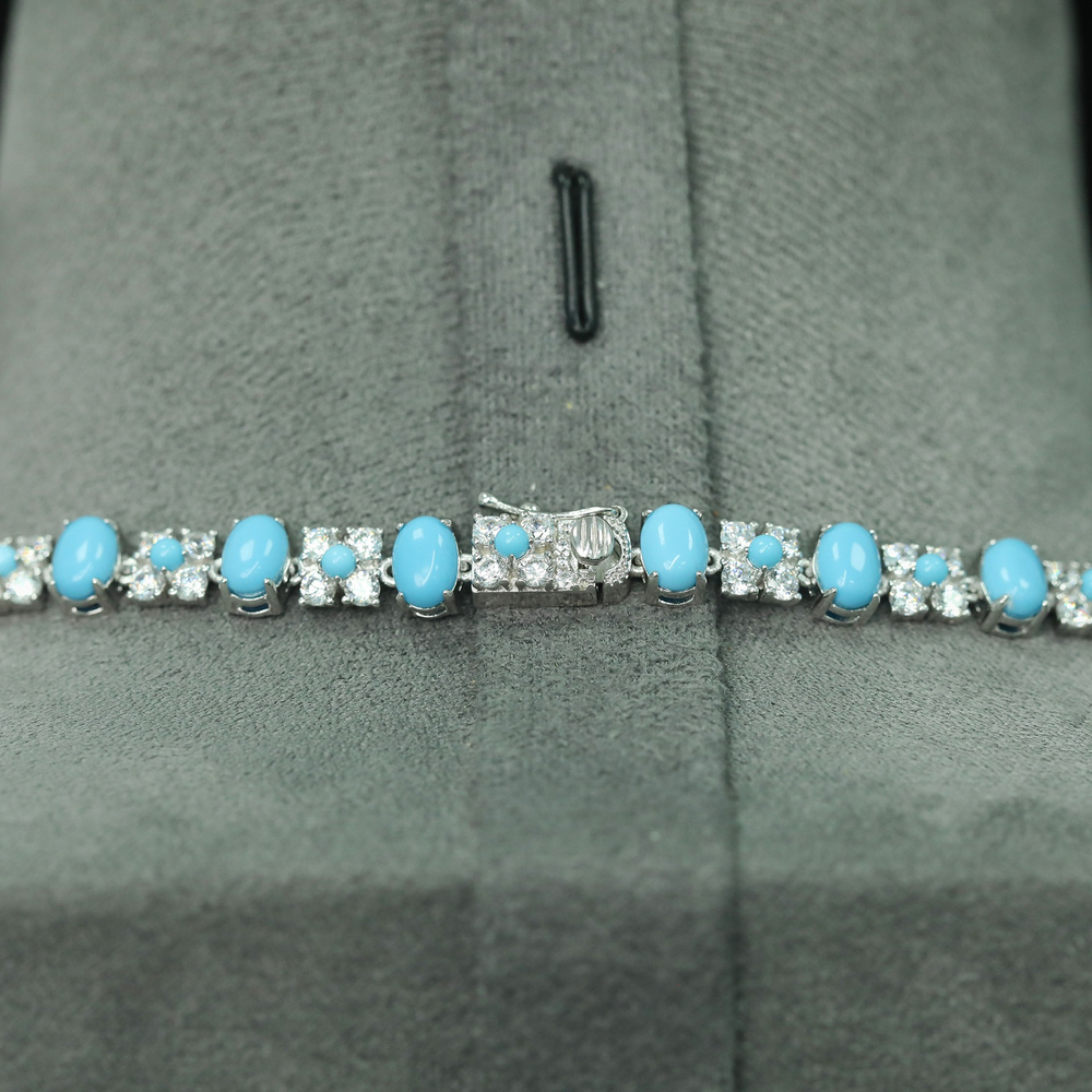 Колье голубые цветы в камнях