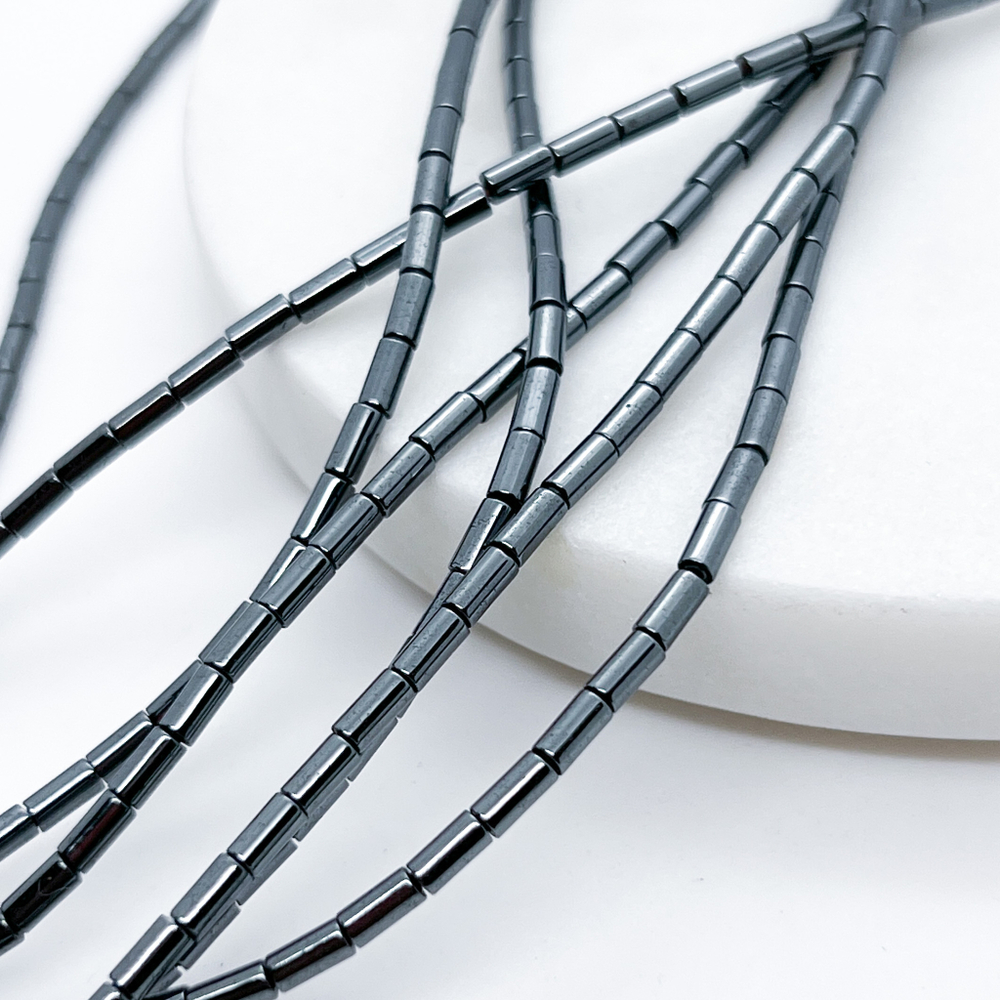 Гематит (имитация), цвет черный, размер около 4,8*2,3 мм, цена за нить 36 см