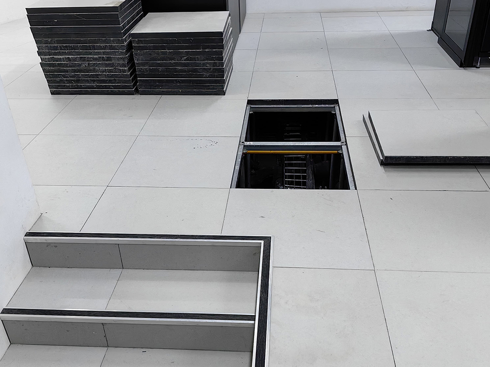 ТМС Панель фальшпола (сульфат кальция) - сталь (0,5 мм), антистатич. HPL (1,2 мм), 600x600x38 мм