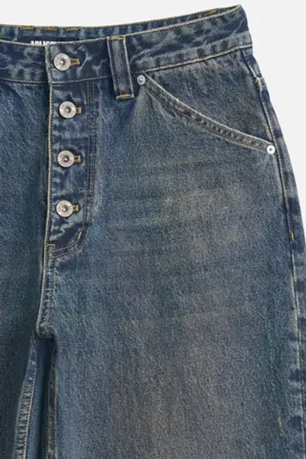 Джинсы-трубы с винтажным эффектом