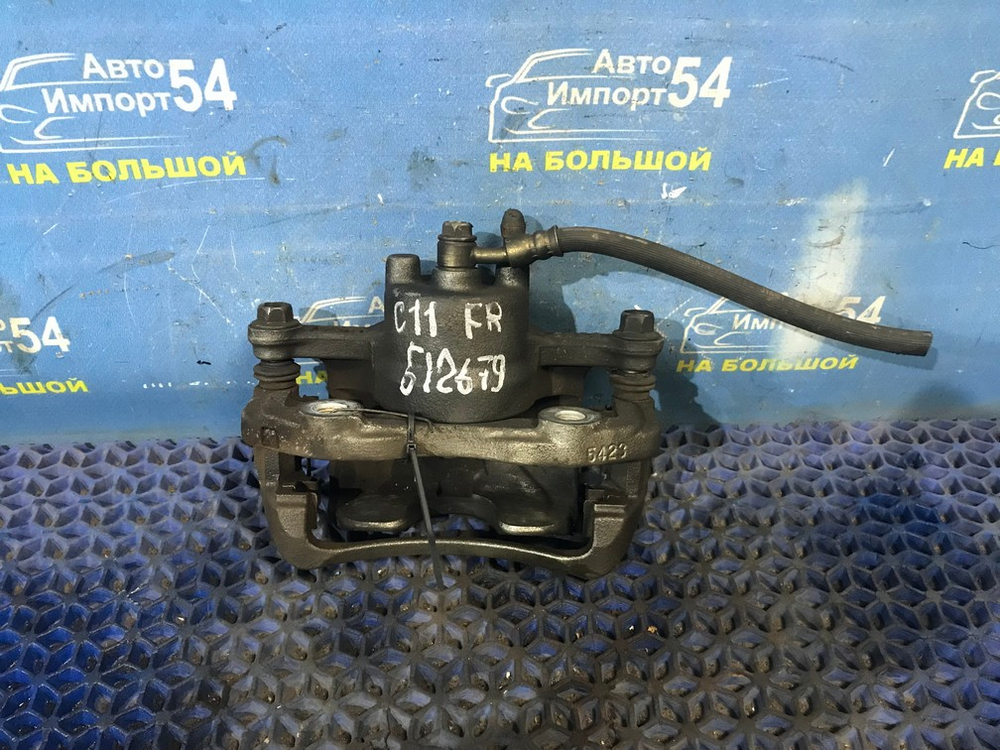 Суппорт тормозной передний правый NISSAN TIIDA 2004-2012