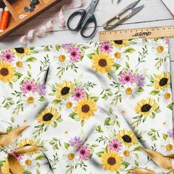 Ткань кулирная гладь разноцветные ромашки и подсолнухи на белом фоне