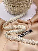 Тесьма белая (молочная) плетеная с биконусами