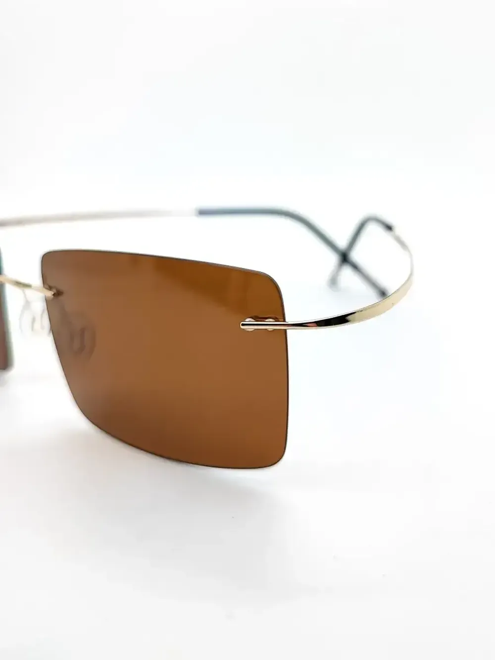 Титановые солнцезащитные очки с поляризацией