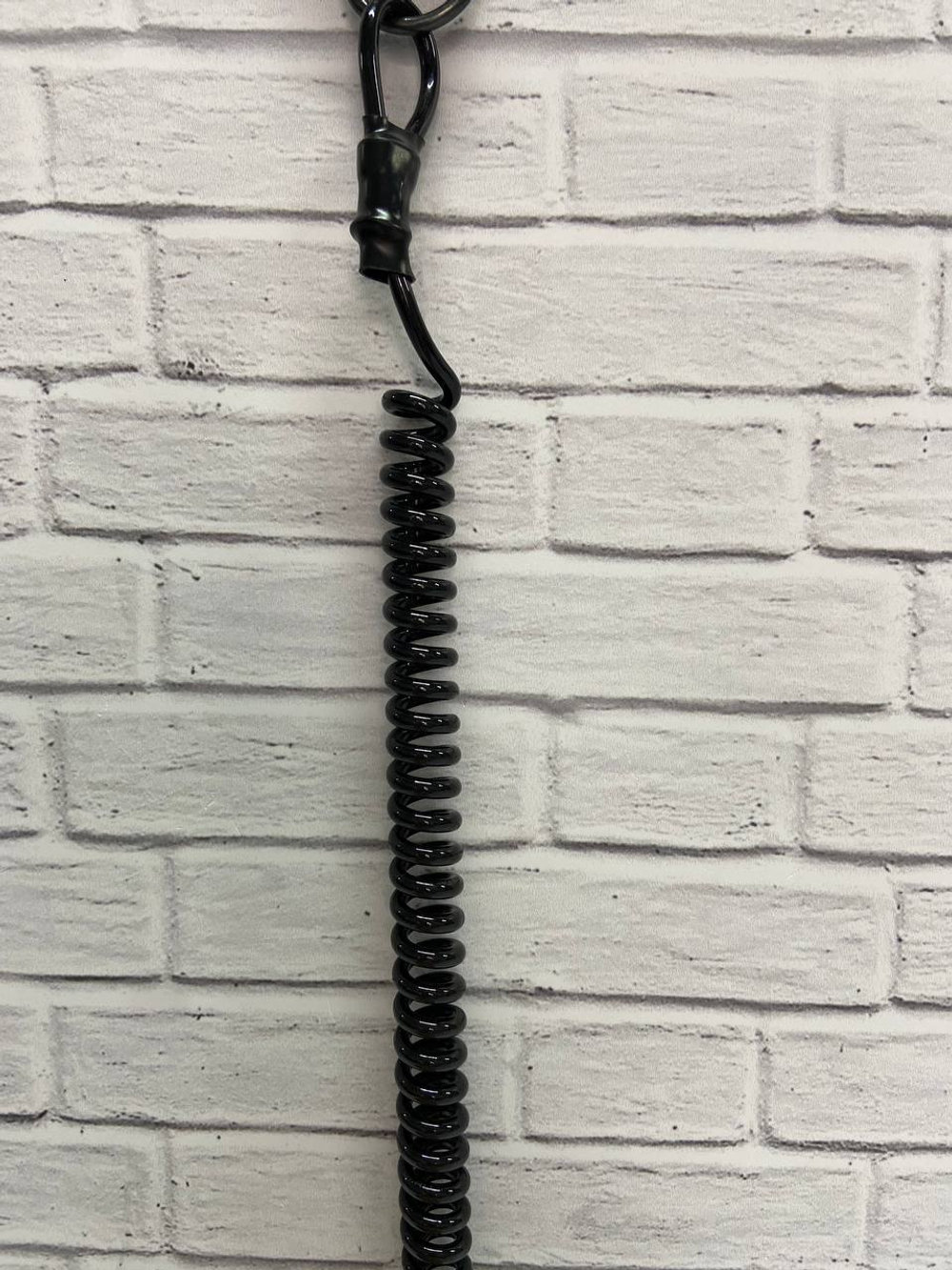 Страховочный тренчик для оружия