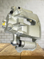 Суппорт тормозной передний левый 581801RA00 для Solaris, Rio