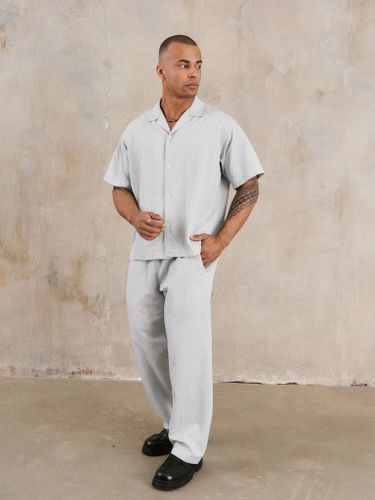 Серый хлопковый костюм Heathen с шортами и брюками