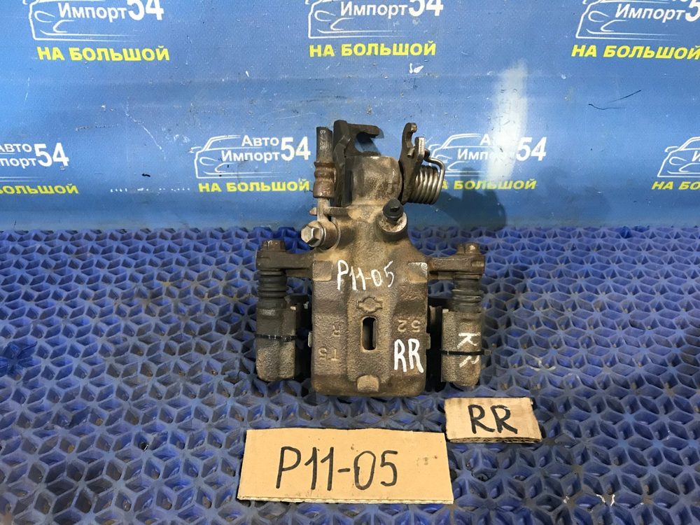 Суппорт тормозной задний правый NISSAN PRIMERA 1999