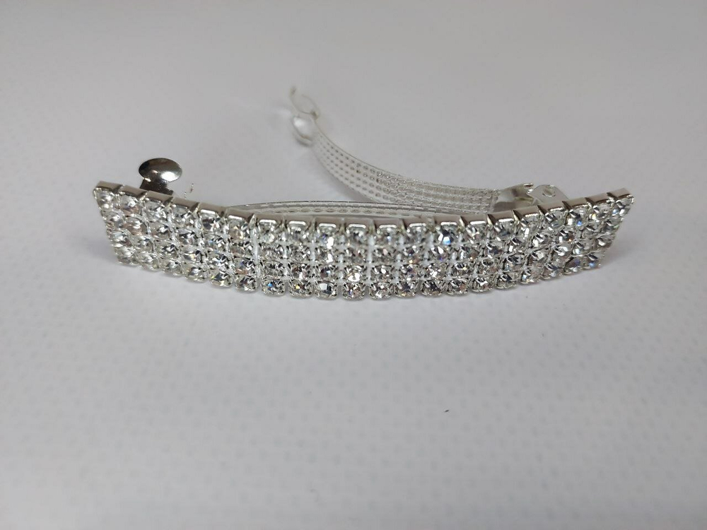 Французская весенняя заколка автомат для волос. Со стразами в четыре ряда. Цвет серебро.