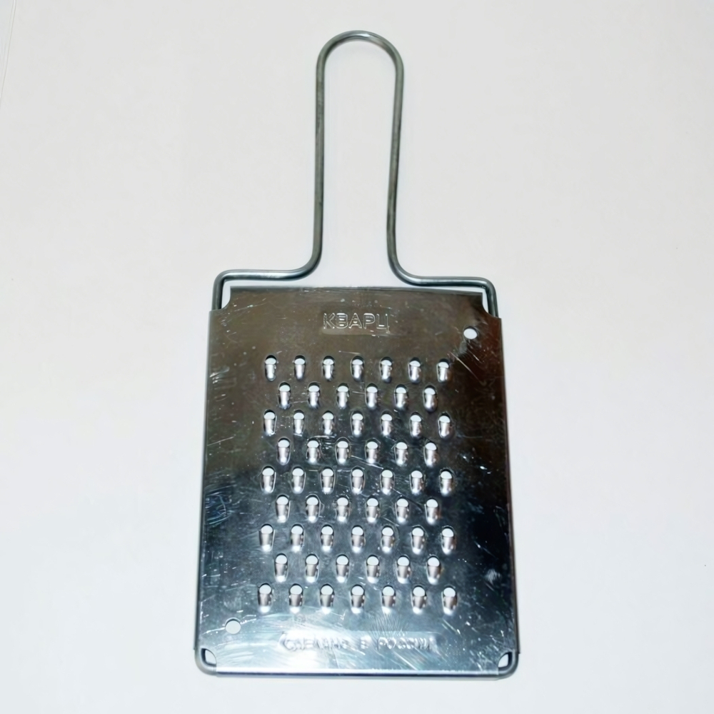 Терка плоская морковная 8,5х20см белая жесть КП01.000.02